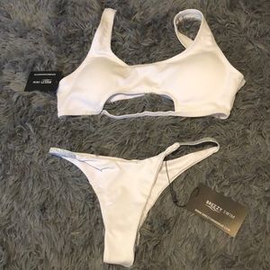 Adorable white bikini with silver trim